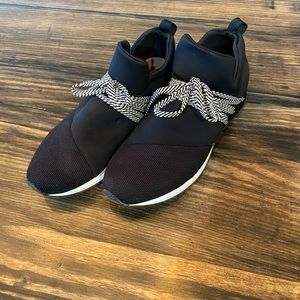 A New Day Gently used black sneakers